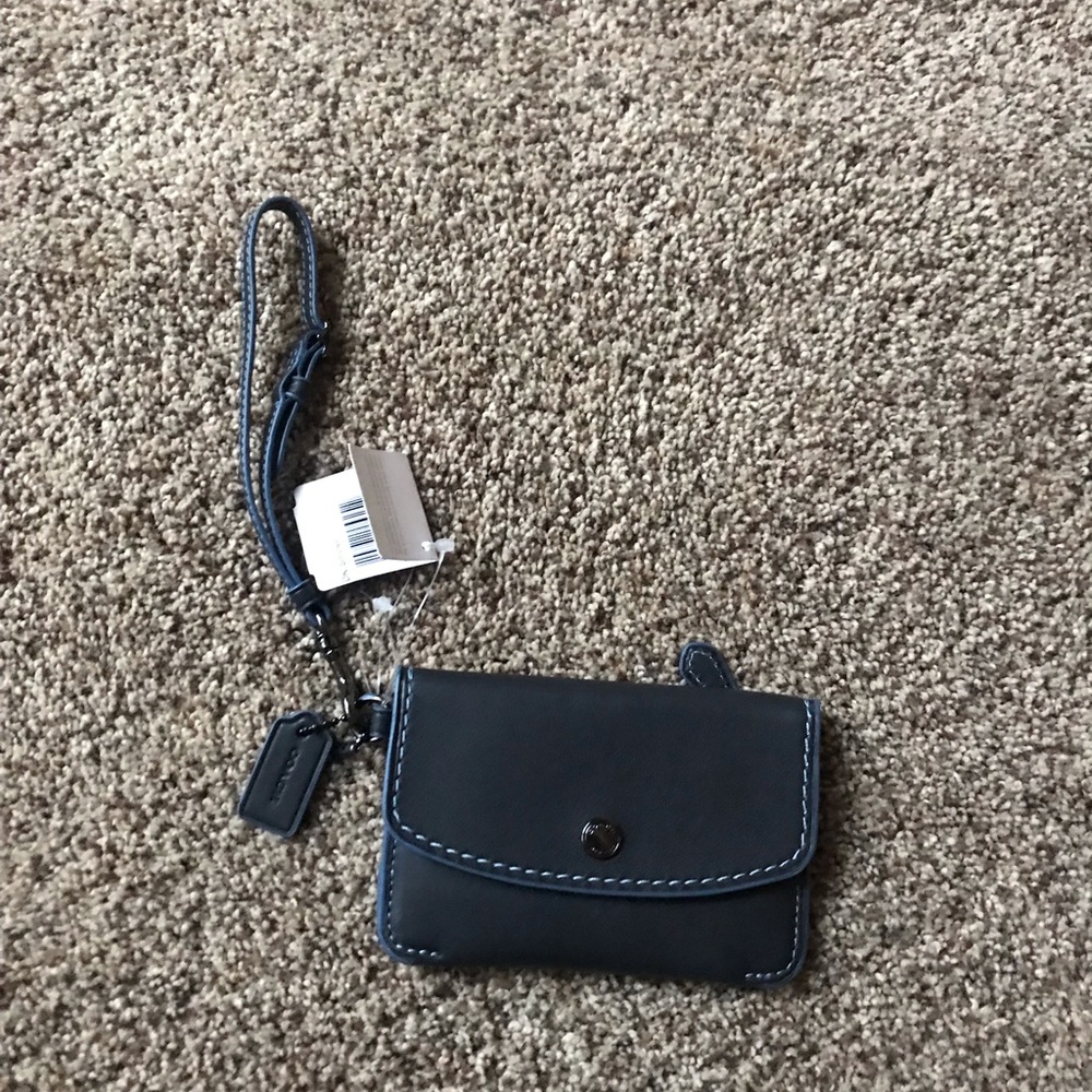 Authentic Coach wristlet.